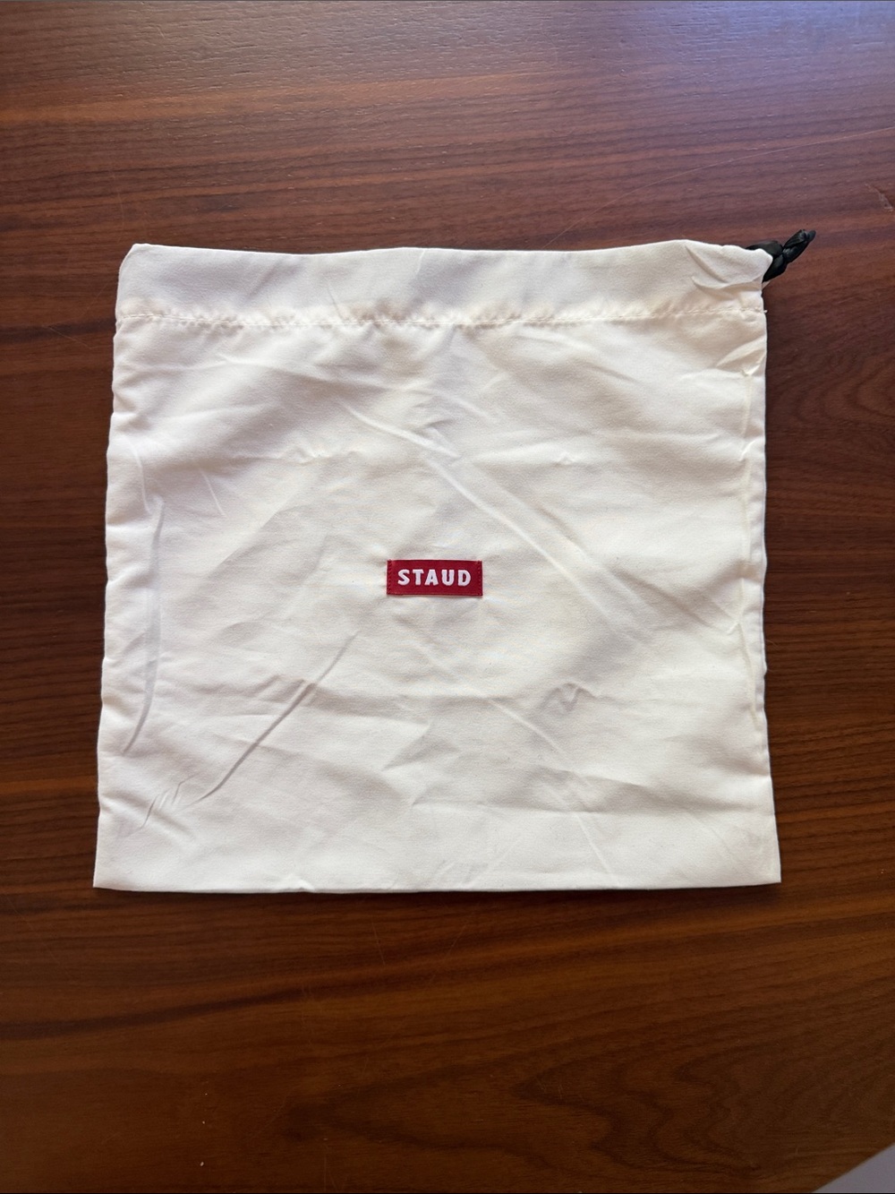 STAUD 12”cx12” Off-White Drawstring Dust Bag with Red Logo Patch